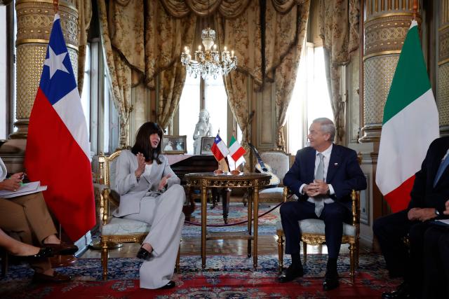 Chile's President-elect Jose Antonio Kast (R) listens to Italy's Minister of University and Research, Anna Maria Bernini, during a meeting at the Cousino Palace in Santiago on March 10, 2026, ahead of the presidential inauguration. (Photo by Raul BRAVO / AFP)
