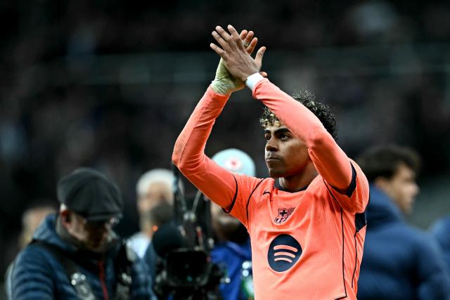 Barcelona's Spanish forward #10 Lamine Yamal applauds the fans following  the UEFA Champion's League, round of 16 football match between Newcastle United and FC Barcelona at St James' Park in Newcastle-upon-Tyne, north east England on March 10, 2026. (Photo by Paul ELLIS / AFP)