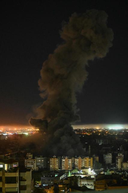 Smoke rises from the site of an Israeli airstrike that targeted an area in Beiruts southern suburbs overnight March 10 to 11, 2026. (Photo by FADEL itani / AFP) / Attention editors: Photo taken with approval from the Ministry of Culture and Islamic Guidance (Ershad) --
AFP covers the war in the Middle East through its extensive regional network, including bureaus in Tehran, Jerusalem, and several neighboring countries. Since the start of the conflict, journalists have been working under increasingly restrictive conditions. Authorities in several countries have limited reporters' movements, photo and live video coverage from sensitive locations. Some governments and armed groups have banned images of missile or drone strikes and other security-related sites. / 