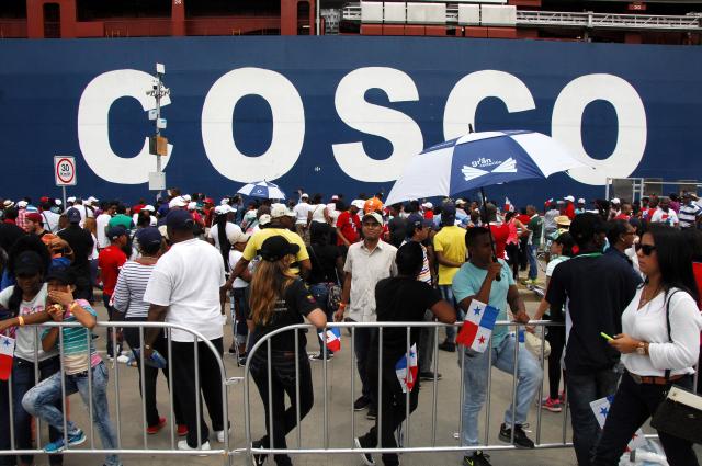 (FILES) Chinese-chartered merchant ship Cosco Shipping Panama crosses the new Agua Clara Locks during the inauguration of the expansion of the Panama Canal in Colon, 80 km from Panama City on June 26, 2016. Chinese shipping company Cosco announced on March 10, 2026, that it will cease operations at a port in the Panama Canal, whose concession was revoked by the Panamanian courts from Hong Kong-based CK Hutchison Holdings, according to an internal memo released by local media. (Photo by Ed Grimaldo / AFP)
