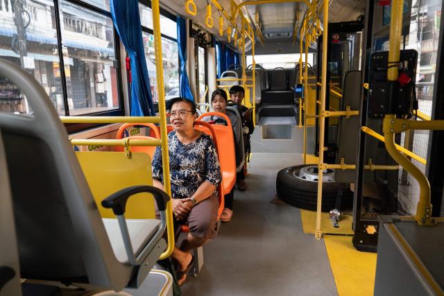 Passengers sit aboard a Bus Rapid Transit (BRT) vehicle in Vientiane on March 10, 2026, as the public transportation system resumes in the Lao capital. (Photo by AFP)