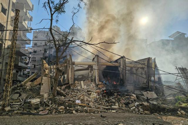 Smoke billows from the site of an Israeli airstrike that targeted the Hadath Lailaky neighbourhood in Beiruts southern suburbs on March 11, 2026. Lebanon was drawn into the Middle East war last week when Hezbollah attacked Israel in response to the killing of the Iranian supreme leader in US-Israeli strikes. Israel, which kept up strikes targeting Hezbollah despite a 2024 ceasefire, has since launched attacks across Lebanon and sent ground troops into border areas. (Photo by AFP) / Attention editors: AFP covers the war in the Middle East through its extensive regional network, including bureaus in Tehran, Jerusalem, and several neighboring countries. Since the start of the conflict, journalists have been working under increasingly restrictive conditions. Authorities in several countries have limited reporters' movements, photo and live video coverage from sensitive locations. Some governments and armed groups have banned images of missile or drone strikes and other security-related sites.