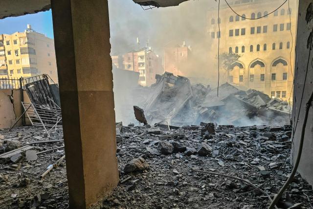 Smoke billows from the site of an Israeli airstrike that targeted the Hadath Lailaky neighbourhood in Beiruts southern suburbs on March 11, 2026. Lebanon was drawn into the Middle East war last week when Hezbollah attacked Israel in response to the killing of the Iranian supreme leader in US-Israeli strikes. Israel, which kept up strikes targeting Hezbollah despite a 2024 ceasefire, has since launched attacks across Lebanon and sent ground troops into border areas. (Photo by AFP) / Attention editors: AFP covers the war in the Middle East through its extensive regional network, including bureaus in Tehran, Jerusalem, and several neighboring countries. Since the start of the conflict, journalists have been working under increasingly restrictive conditions. Authorities in several countries have limited reporters' movements, photo and live video coverage from sensitive locations. Some governments and armed groups have banned images of missile or drone strikes and other security-related sites.