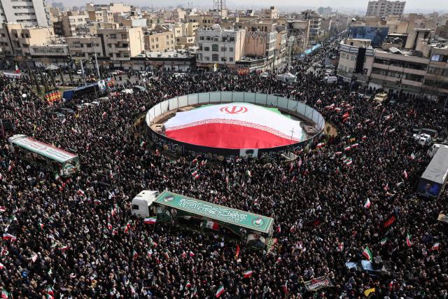 TOPSHOT - Iranians attend the funeral of Iran's Revolutionary Guards Corps (IRGC) commanders, army commanders and others killed in the early days of the United States and Israeli strikes on Iran, at Enghelab Square in Tehran on March 11, 2026. Washington launched strikes with Israel on Iran on February 28, sparking retaliatory strikes by Tehran against Israel and US bases across the Gulf region. (Photo by Atta KENARE / AFP) / Attention editors: Photo taken with approval from the Ministry of Culture and Islamic Guidance (Ershad) --
AFP covers the war in the Middle East through its extensive regional network, including bureaus in Tehran, Jerusalem, and several neighboring countries. Since the start of the conflict, journalists have been working under increasingly restrictive conditions. Authorities in several countries have limited reporters' movements, photo and live video coverage from sensitive locations. Some governments and armed groups have banned images of missile or drone strikes and other security-related sites. / 