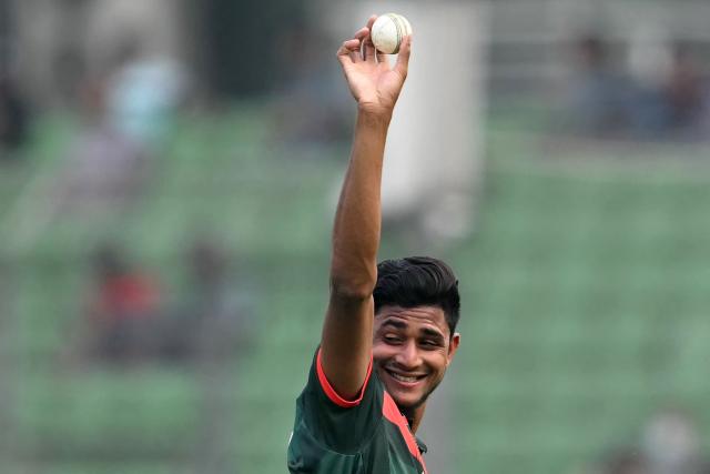 Bangladesh's Nahid Rana shows the ball after taking five-wicket haul during the first one-day international (ODI) cricket match between Bangladesh and Pakistan at Sher-e-Bangla National Stadium in Mirpur on March 11, 2026. (Photo by MUNIR UZ ZAMAN / AFP)