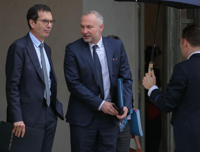 France's Labour Minister Jean-Pierre Farandou and France's junior Minister in charge of parliament relations Laurent Panifous leave after the weekly cabinet meeting at the presidential Elysee Palace in Paris on March 11, 2026. (Photo by Thomas SAMSON / AFP)