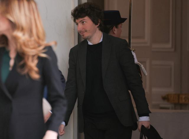 France's Prime minister's Digital Communications Policy Advisor Arthur Empereur leaves after the weekly cabinet meeting at the presidential Elysee Palace in Paris on March 11, 2026. (Photo by Thomas SAMSON / AFP)