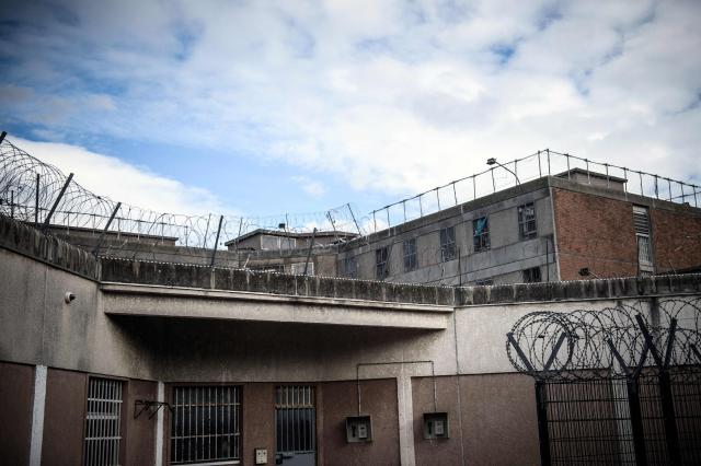 (FILES) A picture taken on March 22, 2017 shows a view of Villepinte's prison, outside Paris. A detainee in his early twenties escaped from the Villepinte prison (Seine-Saint-Denis) on March 7, 2026, with assistance from three accomplices disguised as police officers. The brazen, broad-daylight breakout has reignited concerns over the persistent vulnerabilities within France’s prison system. (Photo by Christophe Petit Tesson / POOL / AFP)