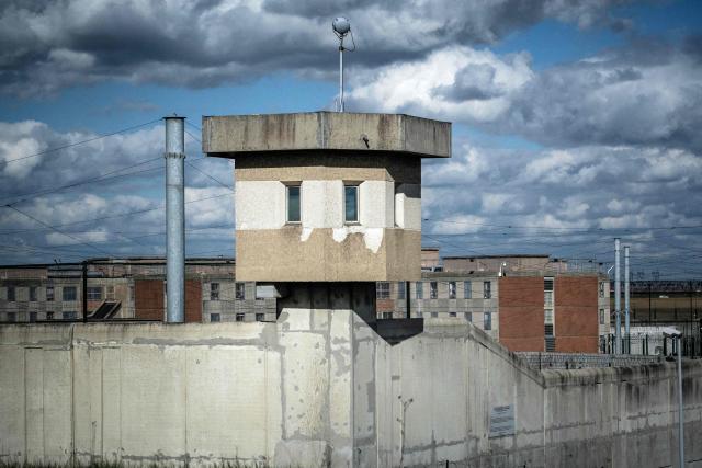 (FILES) A picture taken on March 22, 2017 shows the watchtower at Villepinte's prison, outside Paris. A detainee in his early twenties escaped from the Villepinte prison (Seine-Saint-Denis) on March 7, 2026, with assistance from three accomplices disguised as police officers. The brazen, broad-daylight breakout has reignited concerns over the persistent vulnerabilities within France’s prison system. (Photo by Christophe Petit Tesson / POOL / AFP)