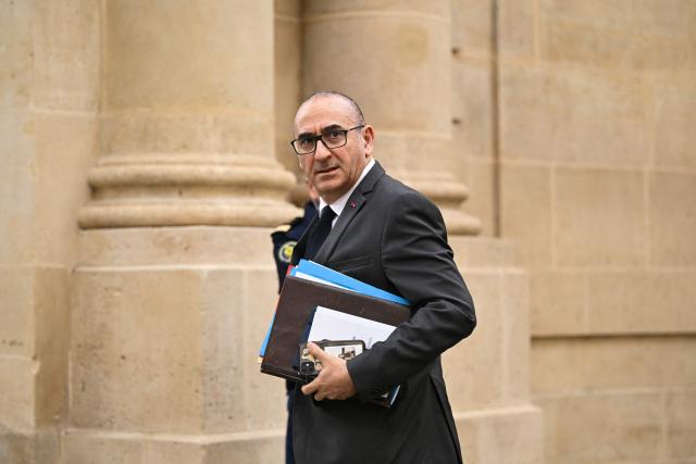 France's Interior Minister Laurent Nunez arrives at the Hotel Matignon to attend a meeting of party leaders on the conflict in Iran, hosted by French Prime, in Paris on March 11, 2026. (Photo by Bertrand GUAY / AFP)