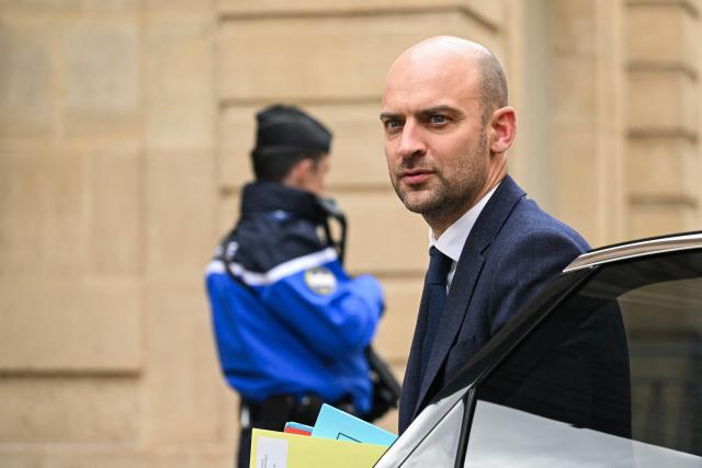 France's Minister for Europe and Foreign Affairs Jean-Noel Barrot arrives at the Hotel Matignon to attend a meeting of party leaders on the conflict in Iran, hosted by French Prime Minister, in Paris on March 11, 2026. (Photo by Bertrand GUAY / AFP)