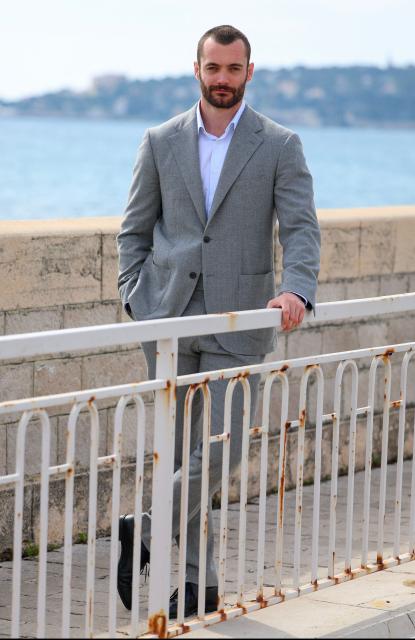 Menton's right wing French mayoral candidate for the list 'Menton Revival' (Renouveau Mentonnais) Louis Sarkozy poses during a photo session in Menton, southeastern France on March 11, 2026. (Photo by Valery HACHE / AFP)