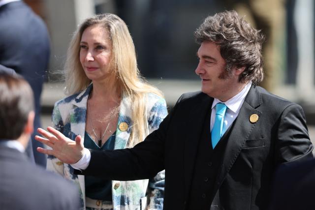 Argentina's President Javier Milei and Argentina's Secretary General of the Presidency Karina Milei arrive at the inauguration ceremony of Chile's new President Jose Antonio Kast at the National Congress in Valparaiso, Chile on March 11, 2026. Chile's most right-wing president in over three decades, Jose Antonio Kast, takes office on March 11, 2026, on a promise to tackle surging rates of violent crime and carry out mass migrant deportations. (Photo by Javier TORRES / AFP)