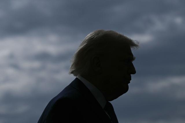 US President Donald Trump speaks to reporters before boarding Marine One as he departs from the South Lawn of the White House in Washington, DC, on March 11, 2026. Trump will be making multiple stops in Kentucky and Ohio including Thermo Fisher Scientific and Verst Logistics. (Photo by Brendan SMIALOWSKI / AFP)