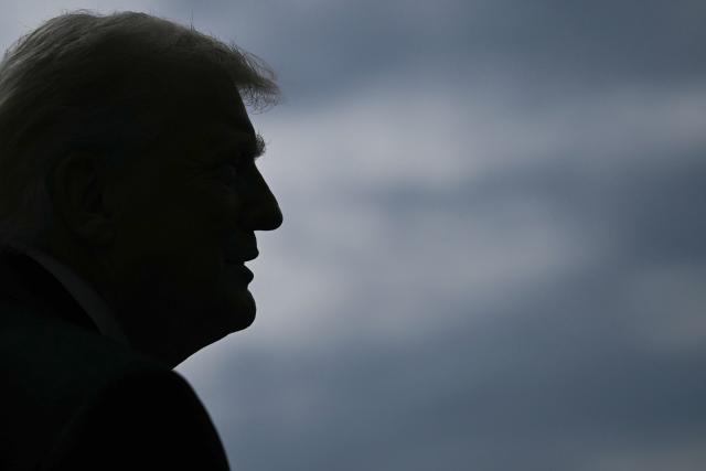 US President Donald Trump speaks to reporters before boarding Marine One as he departs from the South Lawn of the White House in Washington, DC, on March 11, 2026. Trump will be making multiple stops in Kentucky and Ohio including Thermo Fisher Scientific and Verst Logistics. (Photo by Brendan SMIALOWSKI / AFP)
