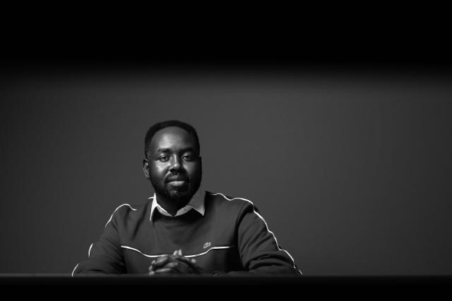 Karam Hassan, former Sudanese refugee, President and Founder of the association "The Voice of Refugees," L'Oreal ambassador, and author poses during a photo session in Paris on March 10, 2026. (Photo by JOEL SAGET / AFP)