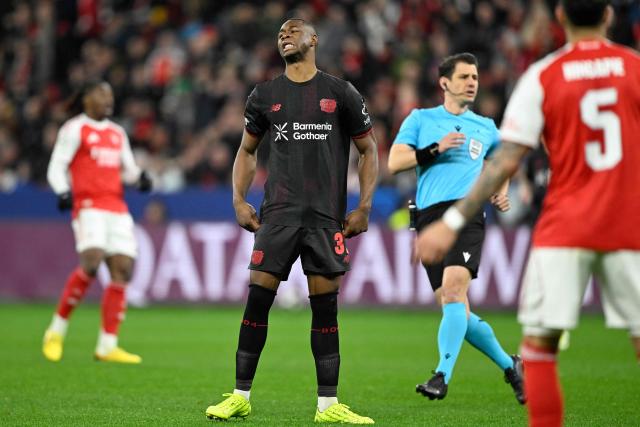 Bayer Leverkusen's Cameroonian forward #35 Christian Kofane reacts during the UEFA Champions League, Last 16, first-leg football match Bayer 04 Leverkusen vs Arsenal in Leverkusen, western Germany, on March 11, 2026. (Photo by INA FASSBENDER / AFP)