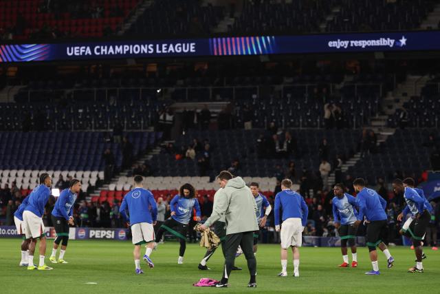 Chelsea's players warm up ahead of the UEFA Champions League round of 16 first leg football match between Paris Saint-Germain (PSG) and Chelsea at the Parc des Princes stadium in Paris on March 11, 2026. (Photo by FRANCK FIFE / AFP)