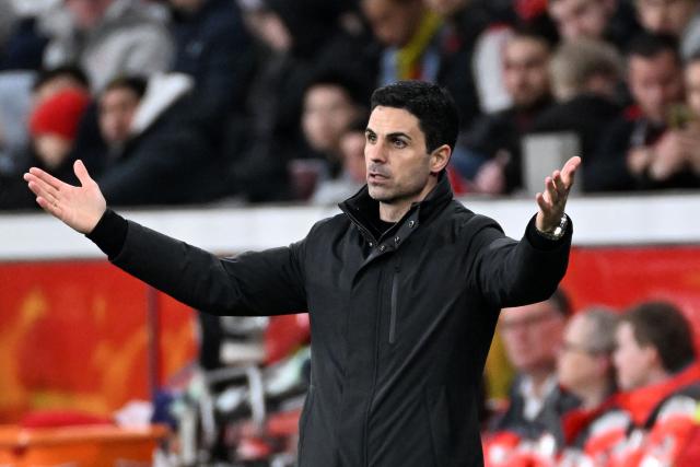 Arsenal's Spanish manager Mikel Arteta reacts during the UEFA Champions League, Last 16, first-leg football match Bayer 04 Leverkusen vs Arsenal in Leverkusen, western Germany, on March 11, 2026. (Photo by UWE KRAFT / AFP)