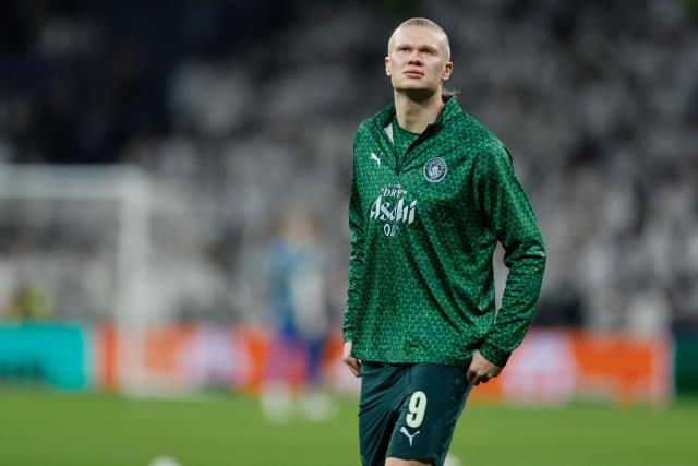 Manchester City's Norwegian forward #09 Erling Haaland warmS up before the UEFA Champions League last 16 first leg football match between Real Madrid CF and Manchester City at Santiago Bernabeu Stadium in Madrid on March 11, 2026. (Photo by Oscar DEL POZO / AFP)