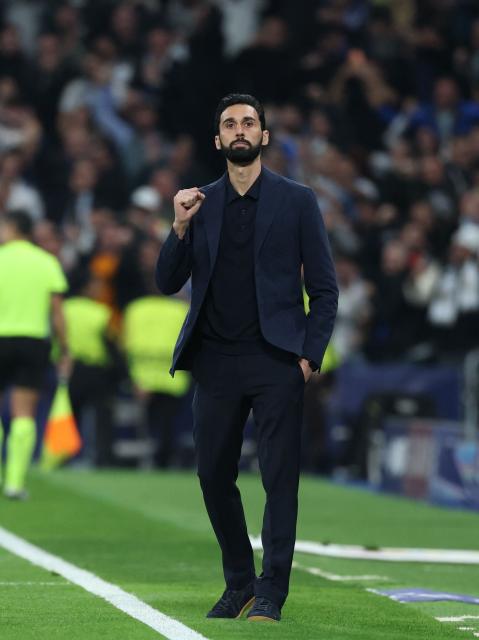 Real Madrid's Spanish coach Alvaro Arbeloa celebrates the opening goal during the UEFA Champions League last 16 first leg football match between Real Madrid CF and Manchester City at Santiago Bernabeu Stadium in Madrid on March 11, 2026. (Photo by Thomas COEX / AFP)