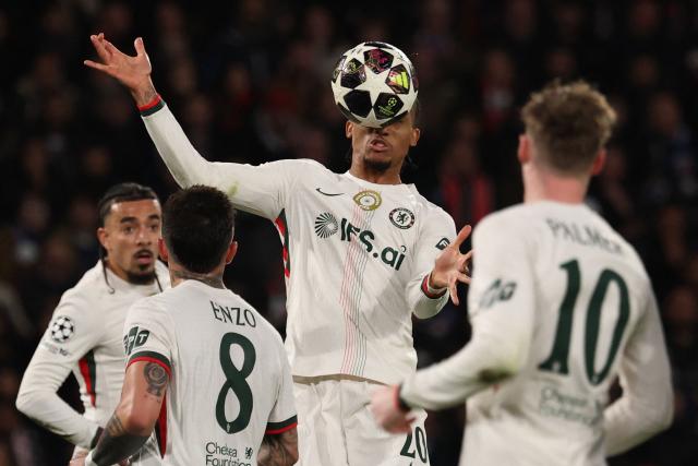 Chelsea's Brazilian forward #20 Joao Pedro heads the ball during the UEFA Champions League round of 16 first leg football match between Paris Saint-Germain (PSG) and Chelsea at the Parc des Princes stadium in Paris on March 11, 2026. (Photo by FRANCK FIFE / AFP)