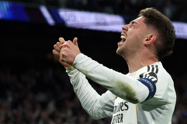 Real Madrid's Uruguayan midfielder #08 Federico Valverde celebrates scoring the opening goal during the UEFA Champions League last 16 first leg football match between Real Madrid CF and Manchester City at Santiago Bernabeu Stadium in Madrid on March 11, 2026. (Photo by Pierre-Philippe MARCOU / AFP)
