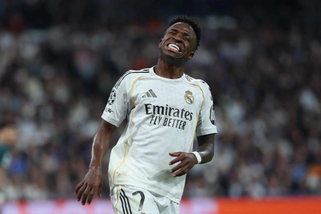 Real Madrid's Brazilian forward #07 Vinicius Junior reacts during the UEFA Champions League last 16 first leg football match between Real Madrid CF and Manchester City at Santiago Bernabeu Stadium in Madrid on March 11, 2026. (Photo by Thomas COEX / AFP)