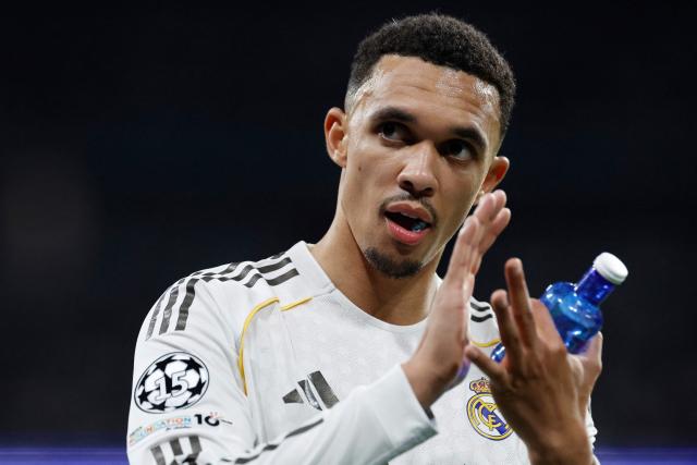 Real Madrid's English defender #12 Trent Alexander-Arnold is substituted during the UEFA Champions League last 16 first leg football match between Real Madrid CF and Manchester City at Santiago Bernabeu Stadium in Madrid on March 11, 2026. (Photo by Oscar DEL POZO / AFP)