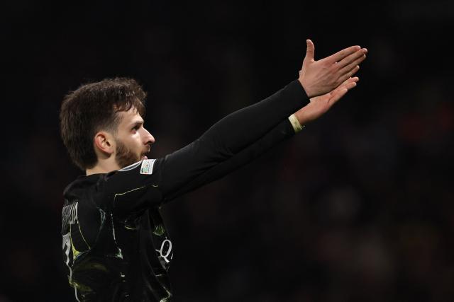 Paris Saint-Germain's Georgian forward #07 Khvicha Kvaratskhelia celebrates after scoring  his side's fourth goal during the UEFA Champions League round of 16 first leg football match between Paris Saint-Germain (PSG) and Chelsea at the Parc des Princes stadium in Paris on March 11, 2026. (Photo by FRANCK FIFE / AFP)