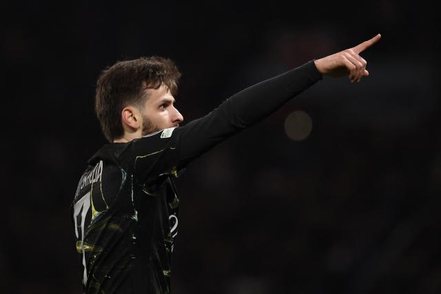Paris Saint-Germain's Georgian forward #07 Khvicha Kvaratskhelia celebrates after scoring  his side's fourth goal during the UEFA Champions League round of 16 first leg football match between Paris Saint-Germain (PSG) and Chelsea at the Parc des Princes stadium in Paris on March 11, 2026. (Photo by FRANCK FIFE / AFP)