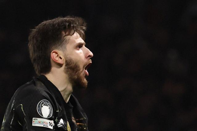 Paris Saint-Germain's Georgian forward #07 Khvicha Kvaratskhelia celebrates after scoring  his side's fourth goal during the UEFA Champions League round of 16 first leg football match between Paris Saint-Germain (PSG) and Chelsea at the Parc des Princes stadium in Paris on March 11, 2026. (Photo by FRANCK FIFE / AFP)