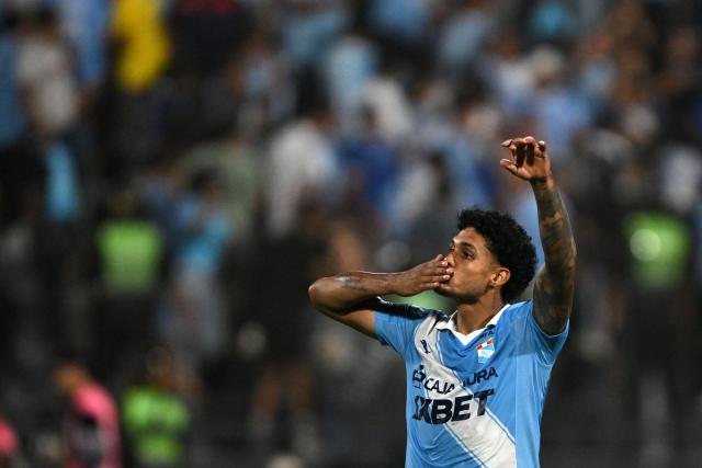 Sporting Cristal's Brazilian defender #90 Cristiano da Silva celebrates after scoring his penalty and winning in the penalty shootout during the Copa Libertadores phase three second-leg football match between Peru's Sporting Cristal and Venezuela's Carabobo at the Alberto Gallardo Stadium in Lima on March 11, 2026. (Photo by ERNESTO BENAVIDES / AFP)