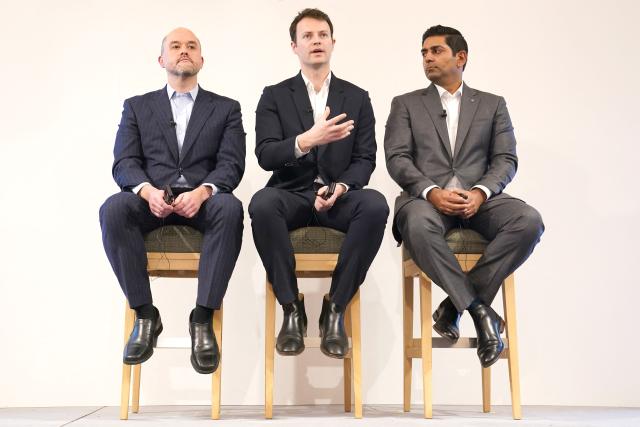 CEO, Nissan Motor Co., Ltd Ivan Espinosa (L), CEO, Wayve Technologies Ltd Alex Kendall (C) and Global Head of Autonomous Mobility and Delivery Uber Technologies Sarfraz Maredia (R) hold their joint press conference in Tokyo on March 12, 2026. Uber announced on March 12, its first robotaxi partnership in Japan, teaming up with Nissan and British artificial intelligence autonomous driving startup Wayve for a trial this year in Tokyo. (Photo by Kazuhiro NOGI / AFP)