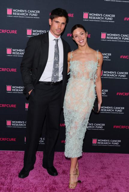 US actress Kayla Ewell and her husband Canadian actor Tanner Novlan attend "An Unforgettable Evening" gala at the Beverly Wilshire Hotel in Beverly Hills, California on March 11, 2026. (Photo by Jean-Baptiste LACROIX / AFP)