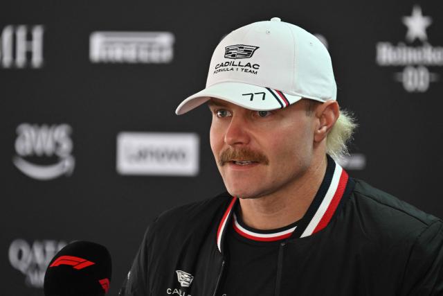 Cadillac's Finnish driver Valtteri Bottas talks to the media in the paddock at the Shanghai International Circuit ahead of the Formula One Chinese Grand Prix in Shanghai on March 12, 2026. (Photo by Hector RETAMAL / AFP)