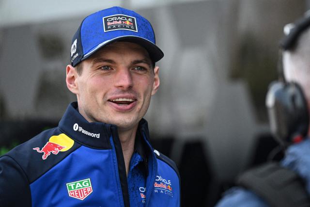 Red Bull Racing's Dutch driver Max Verstappen arrives at the paddock ahead of the Formula One Chinese Grand Prix at the Shanghai International Circuit in Shanghai on March 12, 2026. (Photo by Jade GAO / AFP)