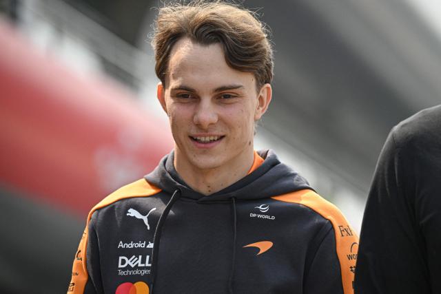 McLaren's Australian driver Oscar Piastri arrives at the paddock ahead of the Formula One Chinese Grand Prix at the Shanghai International Circuit in Shanghai on March 12, 2026. (Photo by Jade GAO / AFP)