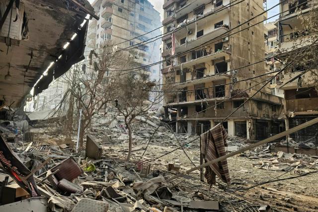 Damaged buildings are pictured at the site of overnight Israeli airstrikes in the southern suburbs of Beirut on March 12, 2026. Lebanon said an Israeli strike on central Beirut's seafront killed at least seven people early on March 12, another attack in the heart of the capital as Iran-backed Hezbollah launched more missiles at Israel.
The Israeli military said separately it had carried out strikes on Beirut's southern suburbs overnight against Hezbollah, which had announced a major new operation against Israel. (Photo by AFP) / 