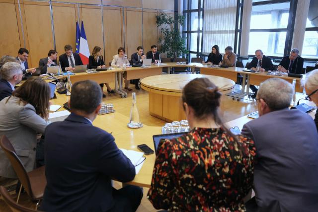 France's Agriculture Minister Annie Genevard (C-R) and France's Government Spokesperson Maud Bregeon (C-L) take part in a intergovernmental meeting with fuel distributors at the French Economy and Finance Ministry in Paris on March 12, 2026. In response to soaring prices at the pump linked to the war in the Middle East, France's Prime minister requested yesterday proposals to protect consumers, while some retailers are already anticipating sharp price drops as early as this week. (Photo by Thomas SAMSON / AFP)