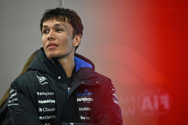 Williams' Thai driver Alexander Albon arrives for a press conference ahead of the Formula One Chinese Grand Prix at the Shanghai International Circuit in Shanghai on March 12, 2026. (Photo by Jade GAO / AFP)