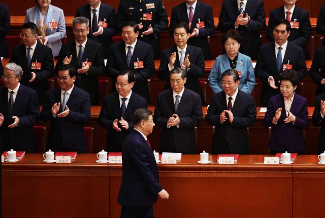 Chinese President Xi Jinping arrives during the closing session of the National People's Congress (NPC) at the Great Hall of the People in Beijing on March 12, 2026. (Photo by Andres MARTINEZ CASARES / POOL / AFP)
