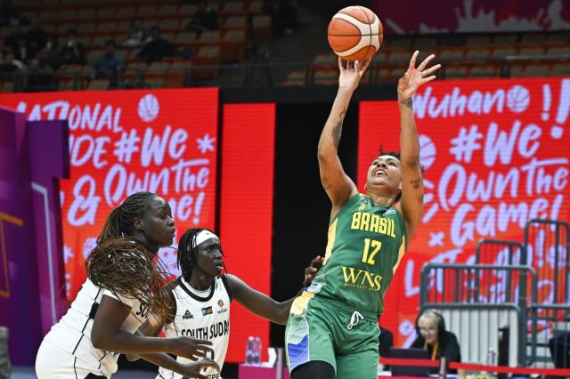 Brazil´s Damiris Dantas (R) shoots during the FIBA Women's Basketball World Cup 2026 qualifying tournament match between Brazil and South Sudan in Wuhan, in China's central Hubei province, on March 12, 2026. (Photo by CN-STR / AFP) / China OUT