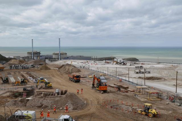 This photograph taken on March 12, 2026, shows the EPR2 construction site of the new reactors currently being built at the Penly nuclear power plant in Petit-Caux on the English channel coast. The nuclear recovery program announced in 2022 by France's President Emmanuel Macron provides for the construction of 6 new generation reactors known as EPR2, built in three pairs, at Penly, Gravelines and then at Bugey. (Photo by Ludovic MARIN / POOL / AFP)