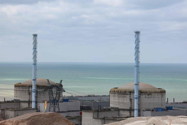 This photograph taken on March 12, 2026, shows the EPR2 construction site of the new reactors currently being built at the Penly nuclear power plant in Petit-Caux on the English channel coast. The nuclear recovery program announced in 2022 by France's President Emmanuel Macron provides for the construction of 6 new generation reactors known as EPR2, built in three pairs, at Penly, Gravelines and then at Bugey. (Photo by Ludovic MARIN / POOL / AFP)