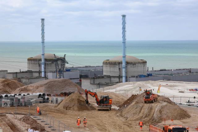 This photograph taken on March 12, 2026, shows the EPR2 construction site of the new reactors currently being built at the Penly nuclear power plant in Petit-Caux on the English channel coast. The nuclear recovery program announced in 2022 by France's President Emmanuel Macron provides for the construction of 6 new generation reactors known as EPR2, built in three pairs, at Penly, Gravelines and then at Bugey. (Photo by Ludovic MARIN / POOL / AFP)