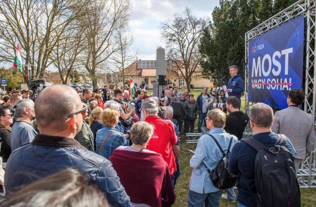Hungarian opposition leader and president of Respect and Freedom (Tisza) Party, Peter Magyar (R) addresses a campaign rally in Ivancsa, in the district of Dunaujvaros, Hungary, on March 12, 2026, ahead of the country's general election on April 12. (Photo by Ferenc ISZA / AFP)