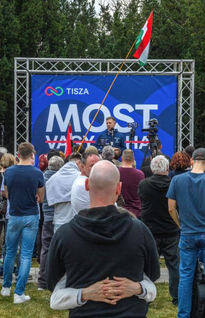 Hungarian opposition leader and president of Respect and Freedom (Tisza) Party, Peter Magyar (back C) addresses a campaign rally in Ivancsa, in the district of Dunaujvaros, Hungary, on March 12, 2026, ahead of the country's general election on April 12. (Photo by Ferenc ISZA / AFP)