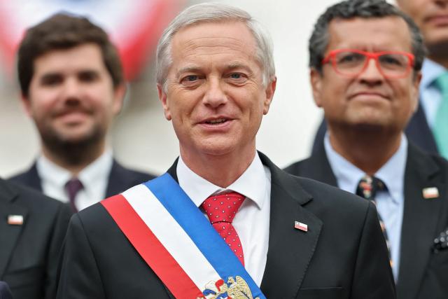 Chile's President Jose Antonio Kast poses for a picture with members of his government at La Moneda presidential palace in Santiago on March 12, 2026. Chile's most right-wing president in over three decades, Jose Antonio Kast, was sworn on March 11, 2026, on a promise to tackle surging rates of violent crime and carry out mass migrant deportations. (Photo by Javier TORRES / AFP)