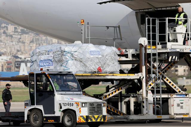 A French cargo plane carrying aid from the Ministry of Health arrived at Beirut International Airport on March 12, 2026. Israeli strikes on Lebanon have killed at least 687 people since March 2, Lebanon's information minister said on March 12, as Israel threatened to expand its operations as it fights Hezbollah in the country. More than 100,000 people have been displaced in Lebanon in a single day, the UN said, as Israel continued to pound Iran-backed Hezbollah militants. (Photo by Anwar AMRO / AFP)
